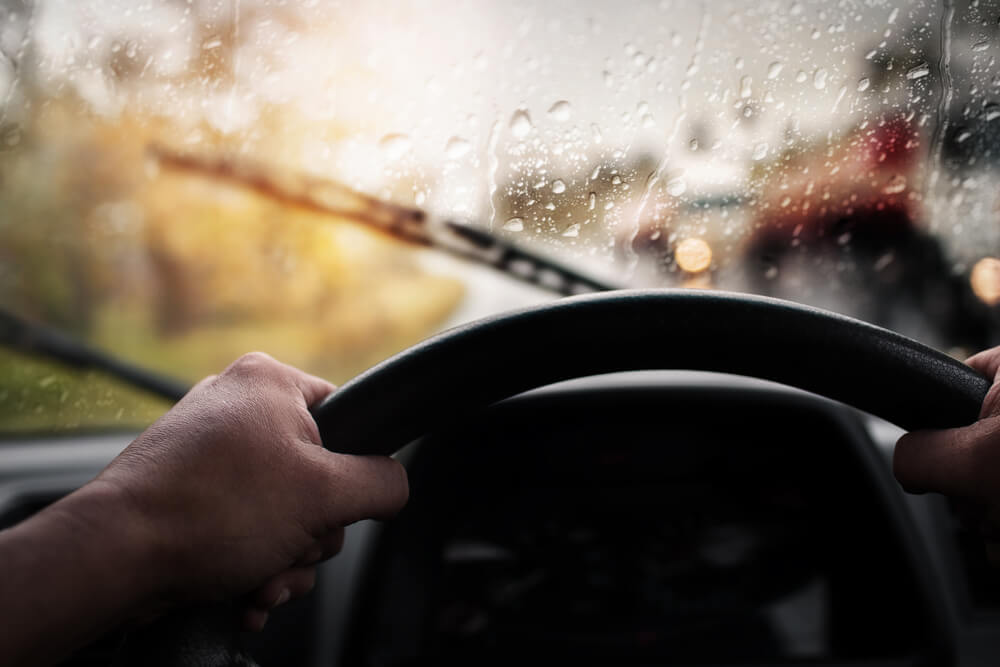 inside of a car dashboard in the rain
