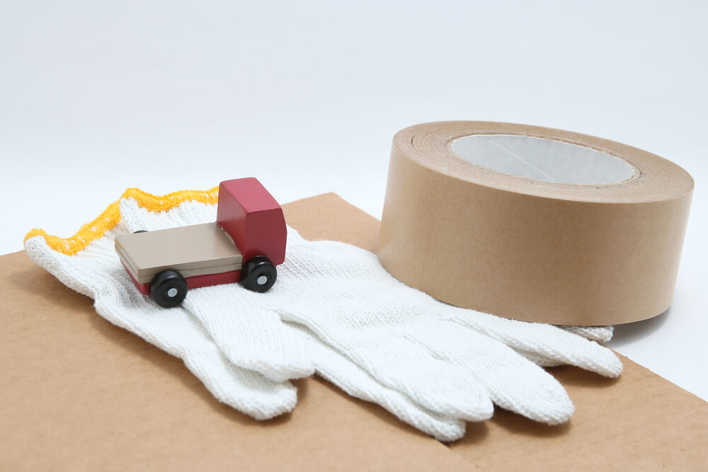 white gloves, little truck, and box