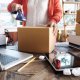 retailer using shipping and third party couriers to best deliver her orders out to customers