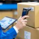 scanning a product barcode sku upc code number for easy organization warehousing and distribution to help businesses streamline and manage operations and inventory