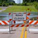 road closed sign in a flood