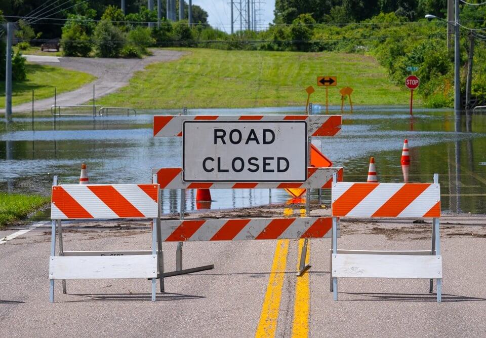 road closed sign in a flood