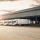 trucks at a warehouse distribution facility for cross docking cross-docking shipments