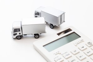truck with a calculator trying to find the dimensional weight of a shipment for finding the shipping costs