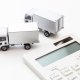 truck with a calculator trying to find the dimensional weight of a shipment for finding the shipping costs